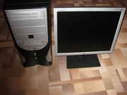 Четырёхъядерный компьютер с ЖК монитором,  клавиатурой и мышкой.